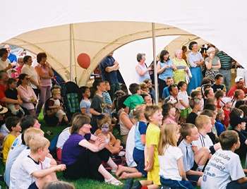 Photo of peolple enjoying Punch & Judy taken by Steve Bryant